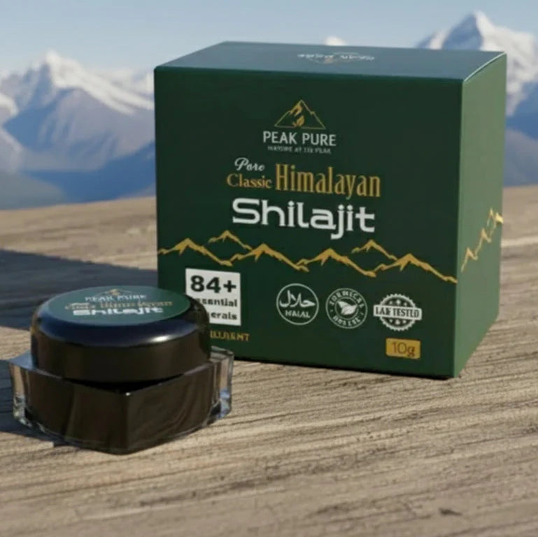 Peak Pure Himalayan Shilajit with packaging on a wooden surface with mountain background