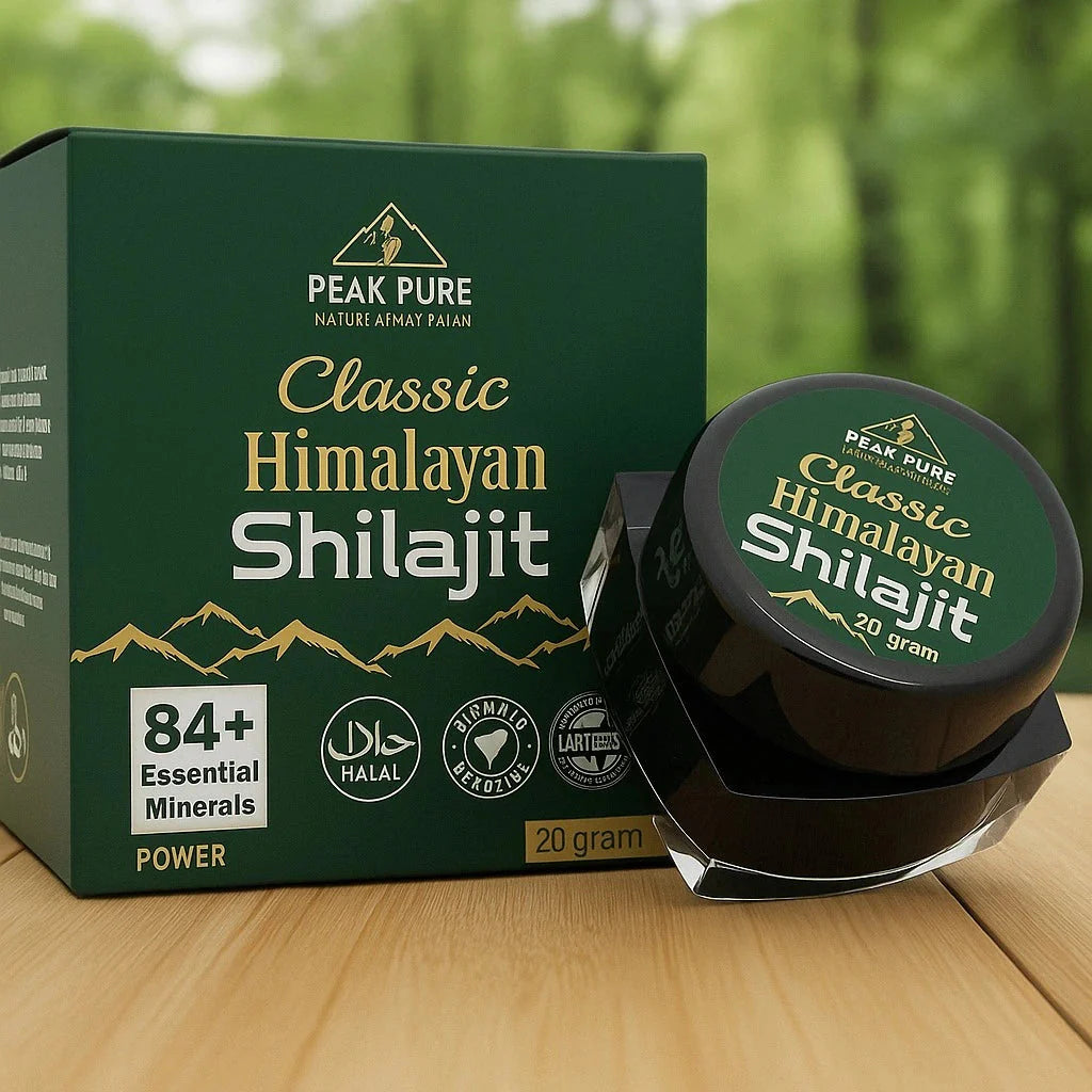 Peak Pure Classic Himalayan Shilajit packaging on a wooden surface with a blurred green forest background