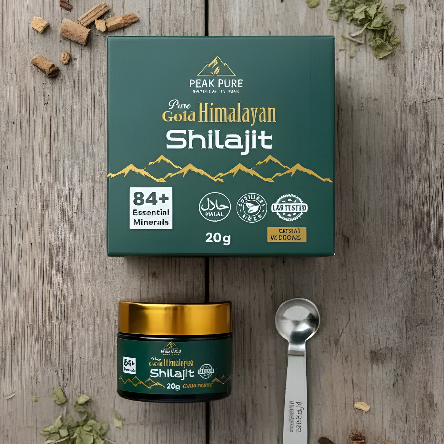 Peak Pure Gold Himalayan Shilajit packaging on a wooden surface with a spoon and small container.